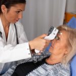 iCare IC200 tonometer measuring a patient in bed