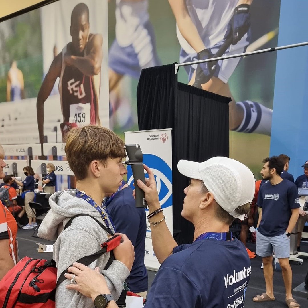 iCare team demonstrating iCare tonometers at the Special Olympics USA Games